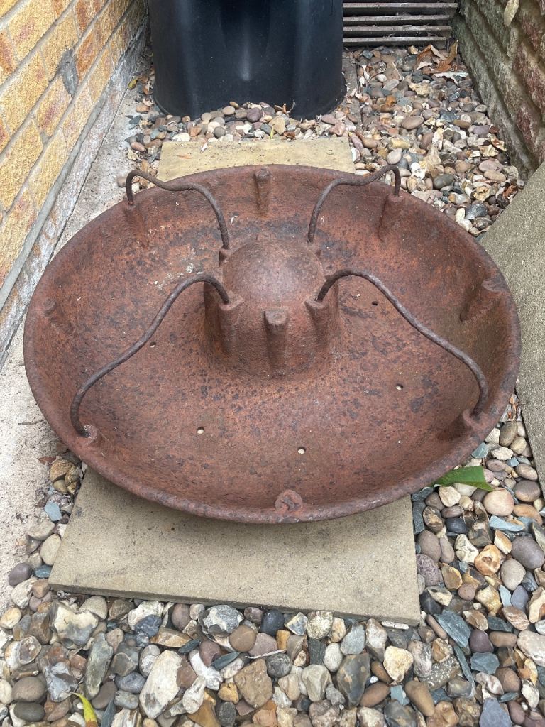 Pig feeder, cast iron