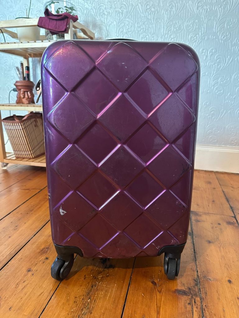 Purple Hard Case Suitcase with Wheels – Fair Condition