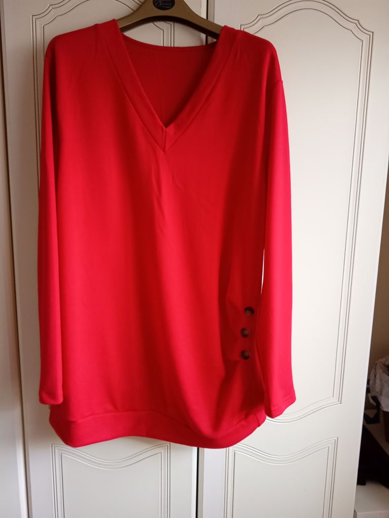 Lovely Red Top but was to long for me as am short