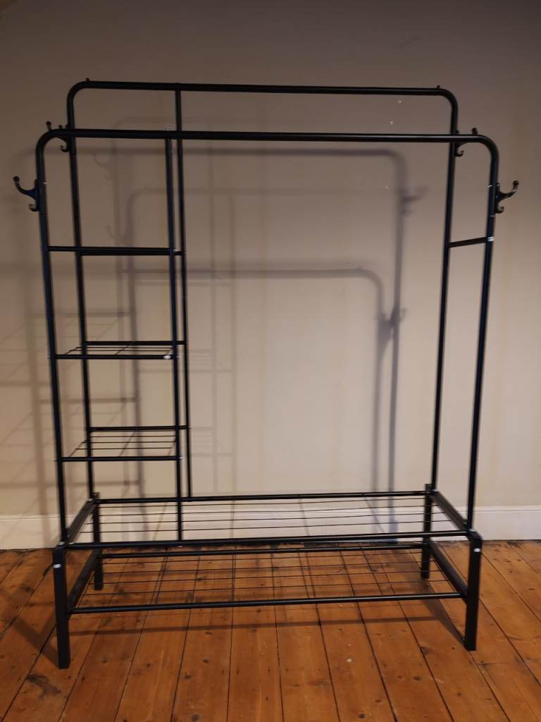 Double clothes rail with shelves