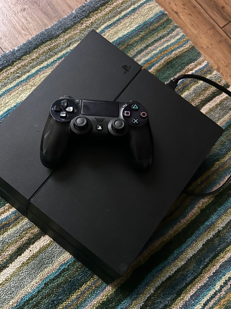 PS4 Console with Controller & Cables – £100