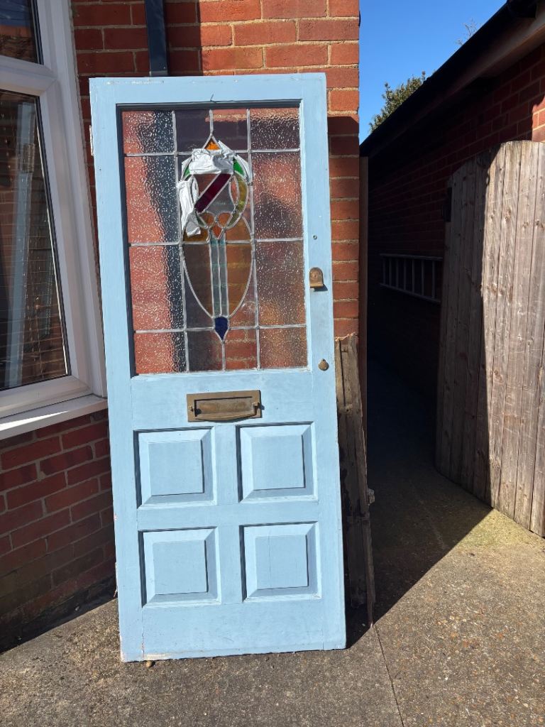 Door with stained glass window insert