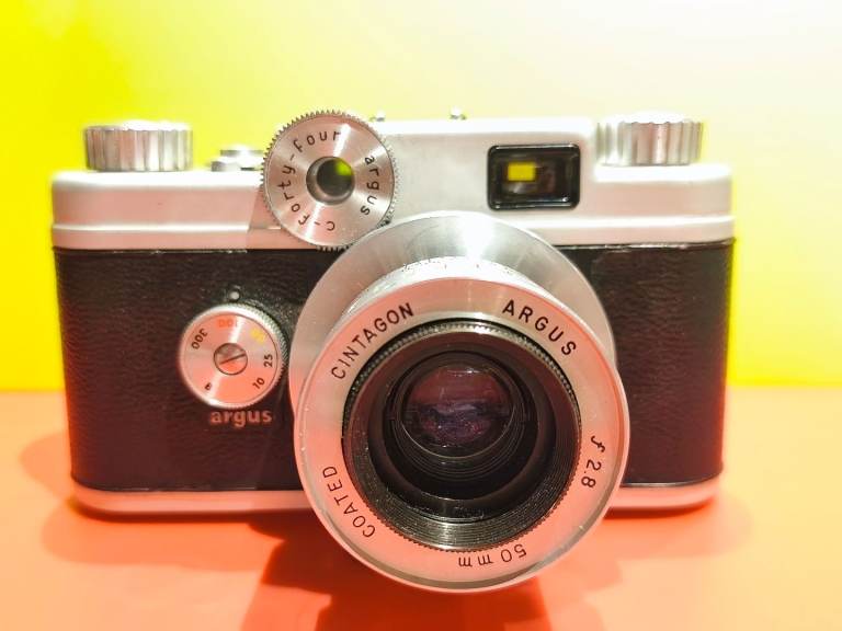 Argus C44 35mm film camera with Cintagon 50 2.8 Lens, Leather case. Rangefinder. Working