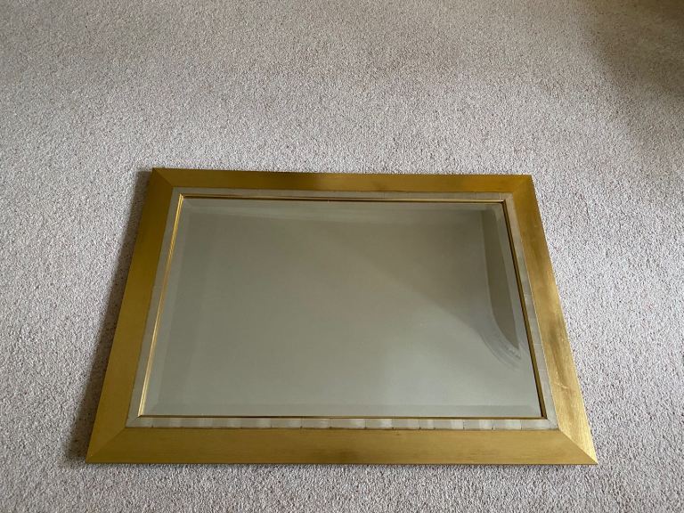 Substantial framed bevelled wall mirror 