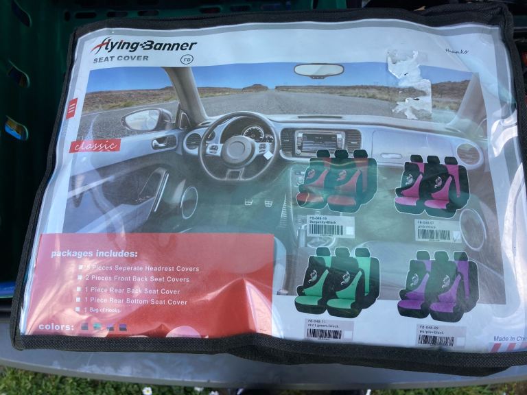 Set of new pink/black Car seat covers set. 