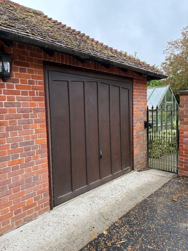 Twin Hormann electric garage doors for sale 