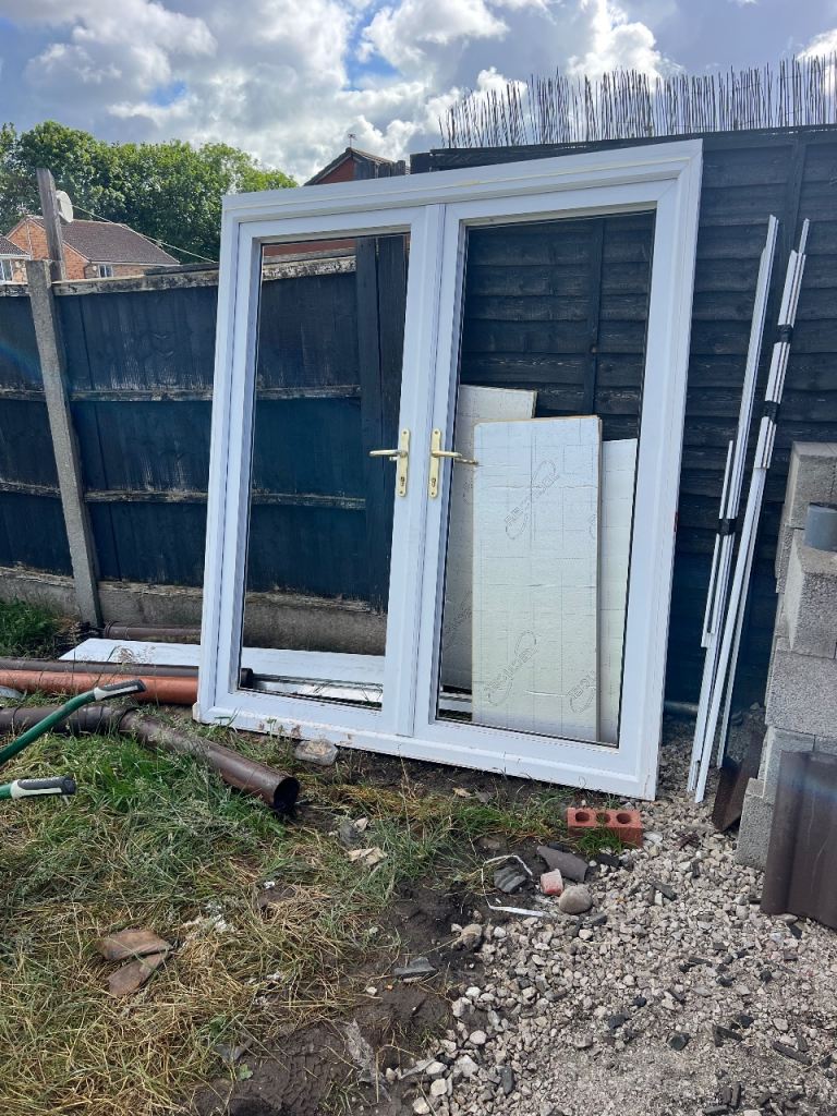 White uPVC French Doors with Brass Handles