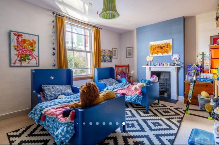 Blue IKEA Busunge extendable children’s beds and mattresses