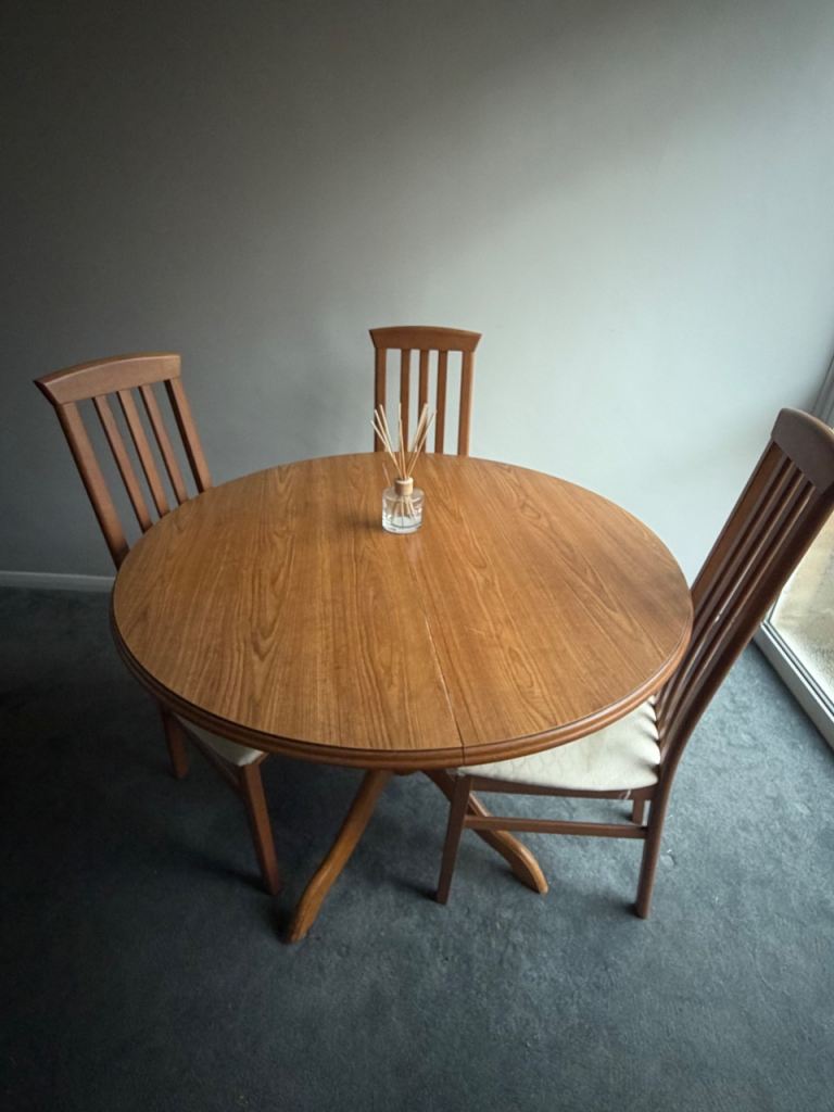Round dining table and chairs