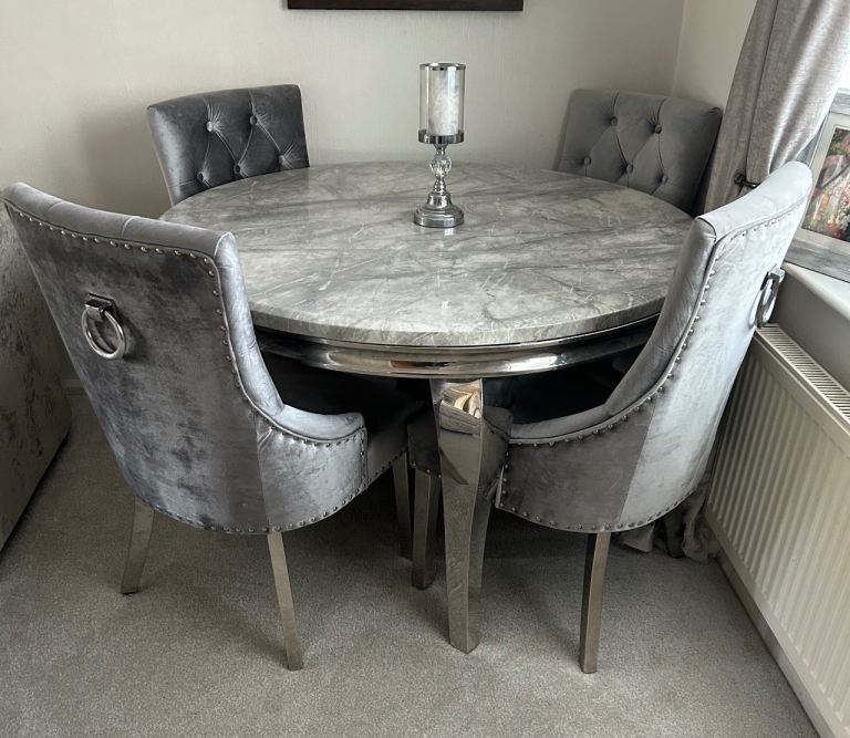 Marble table and velvet chairs 