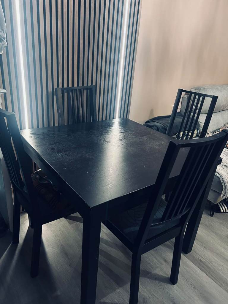 Ikea  extendable Black Wooden Dining Table with Four Matching Chairs
