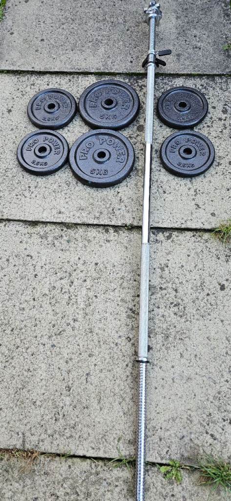 Cast Iron weights plus 5ft Bar
