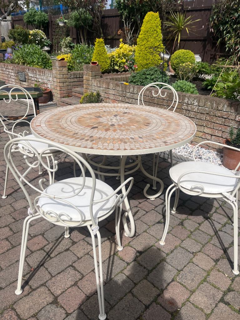 Mosaic table and four chairs 