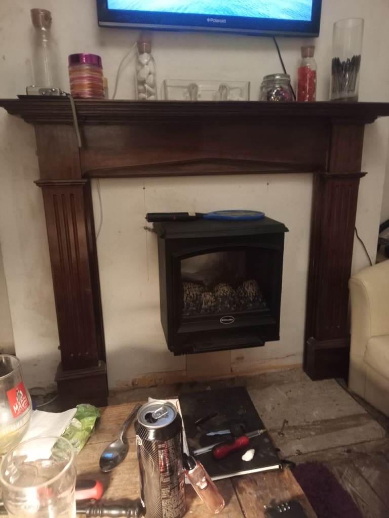 Vintage oak fire surround and electric fire 