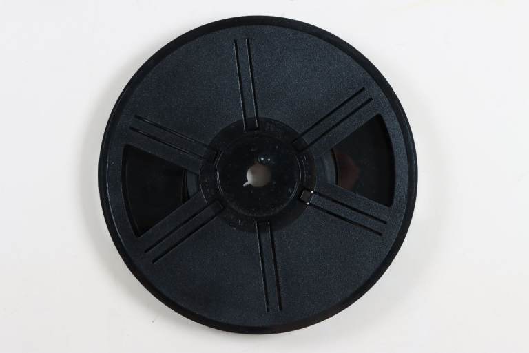 Bell And Howel Auto Loader Film Spool with Unknown Footage