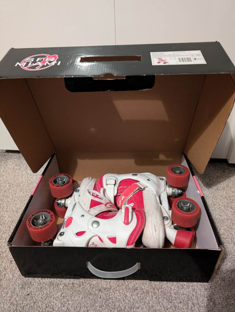 Adjustable quad rollerskates size 12-2