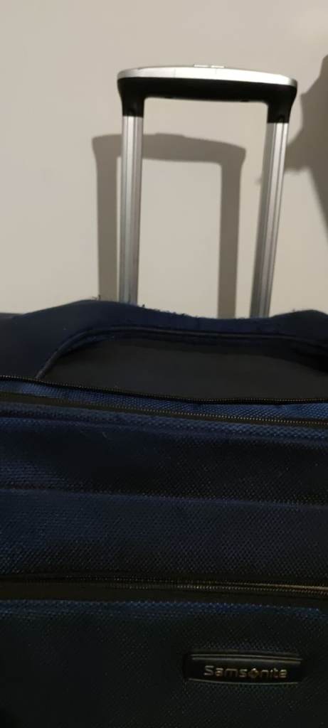 Samsonite large four wheel suitcase 