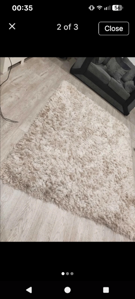 Cream shaggy rug