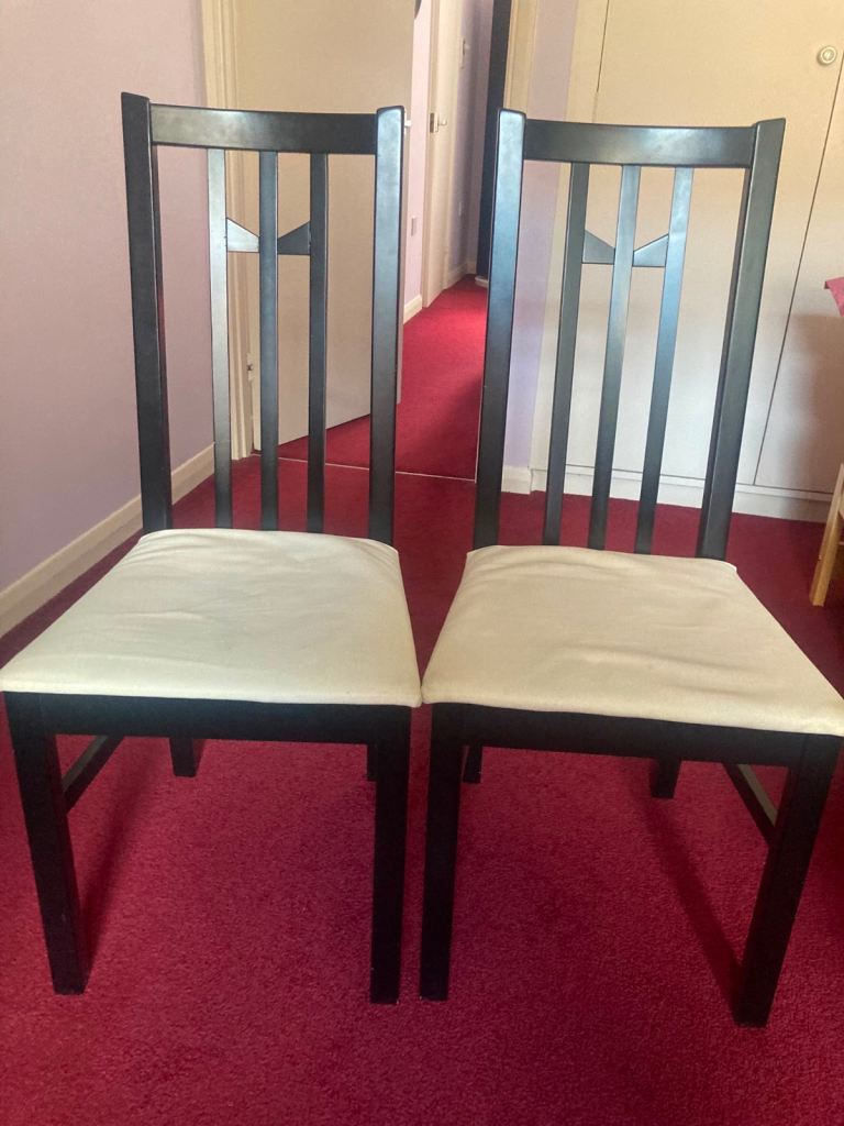 Pair of Black Wooden Dining Chairs with Cream Seats