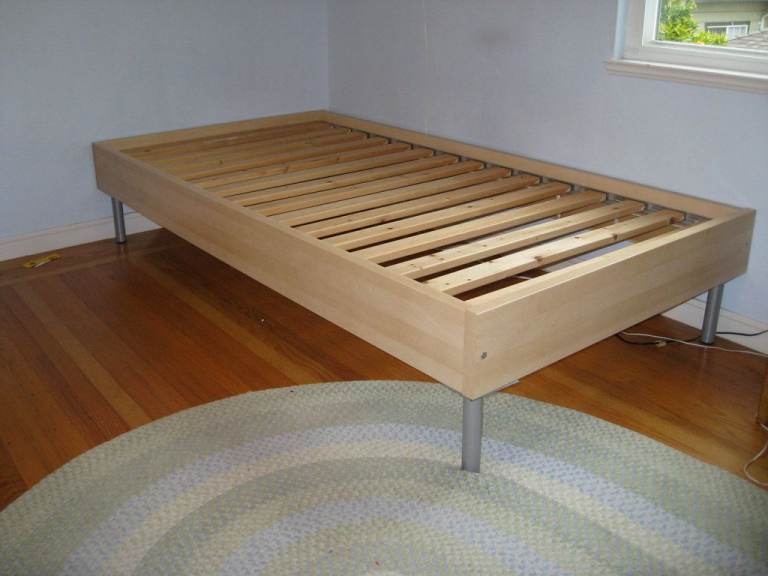 TWO IKEA SINGLE BED FRAMES 