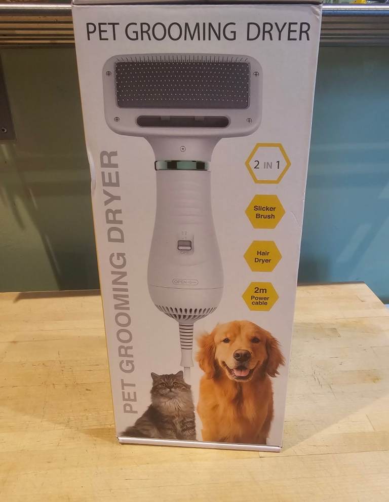 Pet grooming brush/dryer