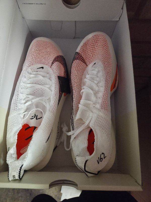 Nike white and orange alphafly 