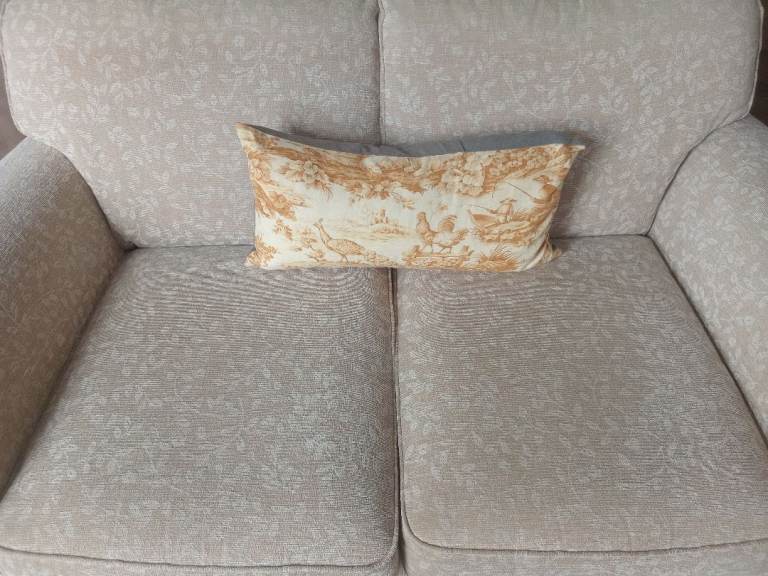 Marks and Spencer, Two seater beige and cream sofa. Used. Good Condition. 