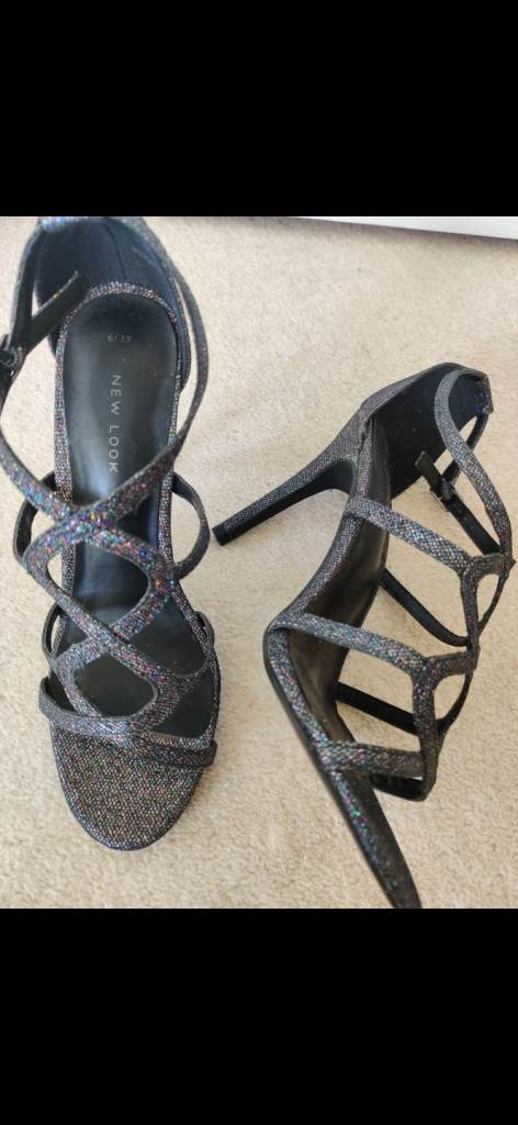 Ladies black shimmer heels. 