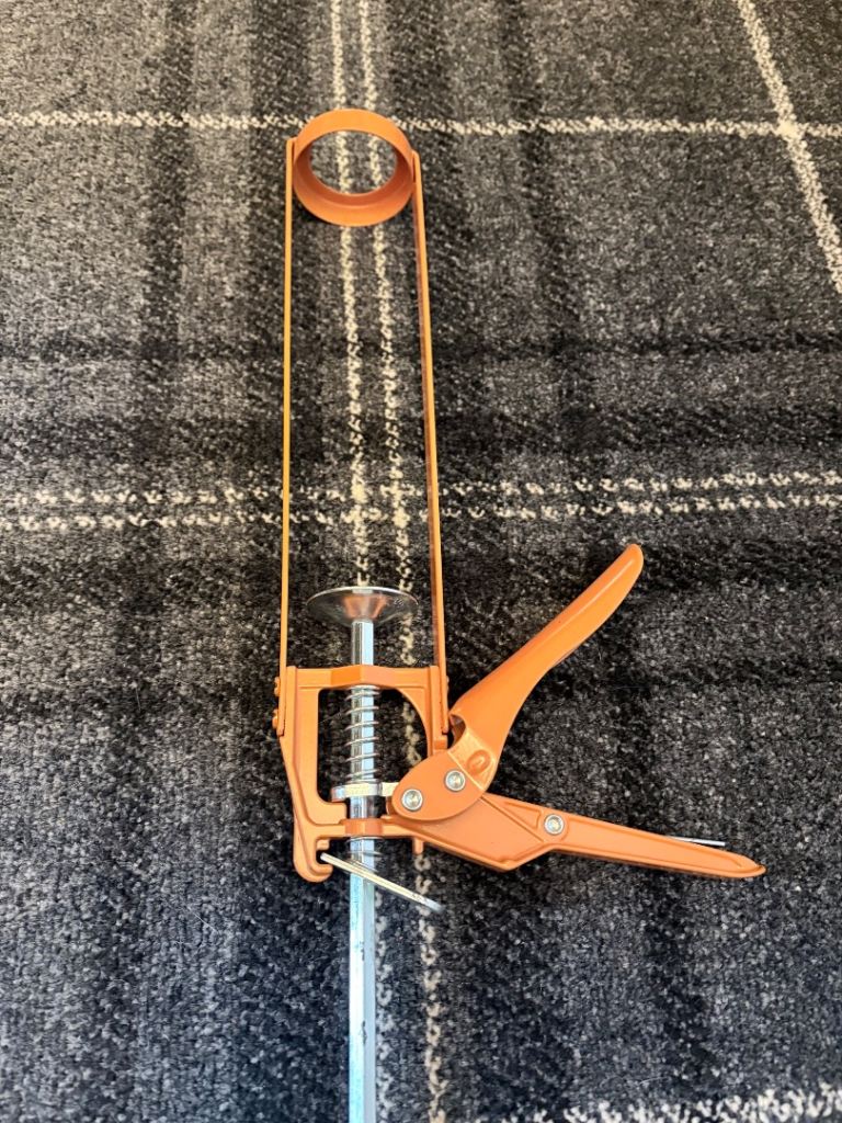 Orange Caulking Gun – Good Condition