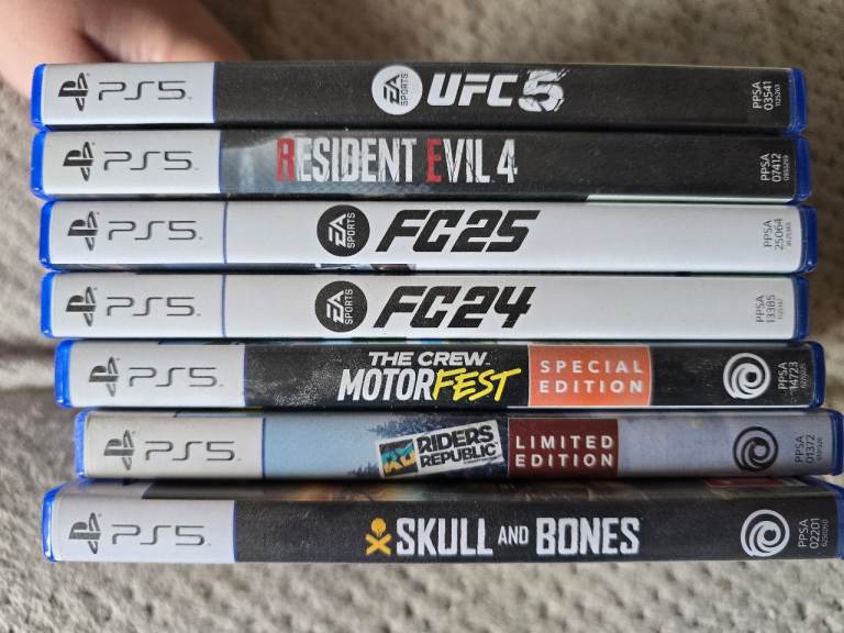 ps5 games and 3 controllers