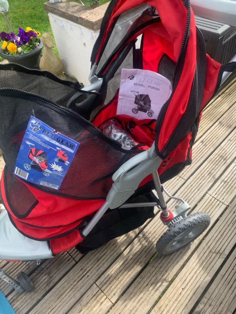 REDUCED.NEW unused Pet stroller/pram with rain cover