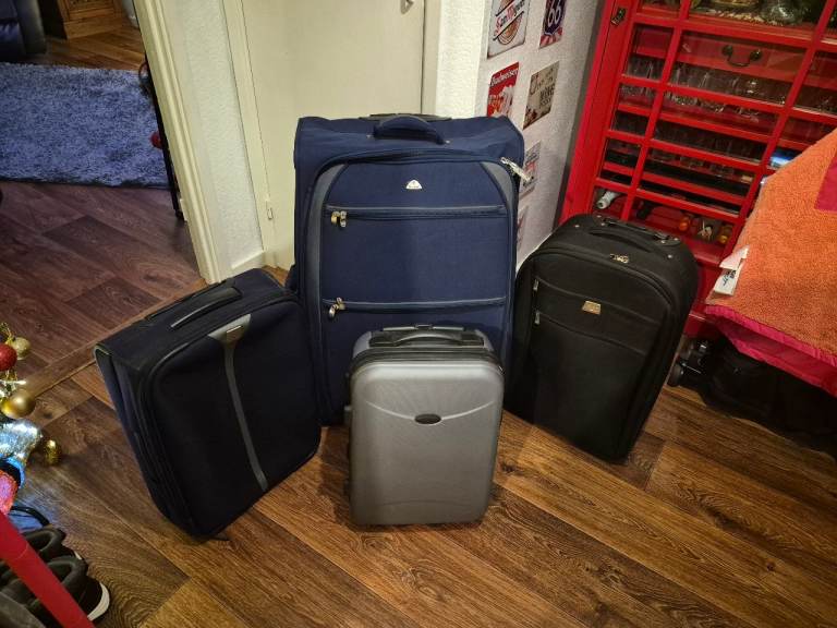 image for FREE X4 SUITCASES FREE