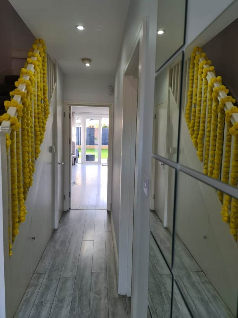 Flower garlands, chair covers and flower wall hire