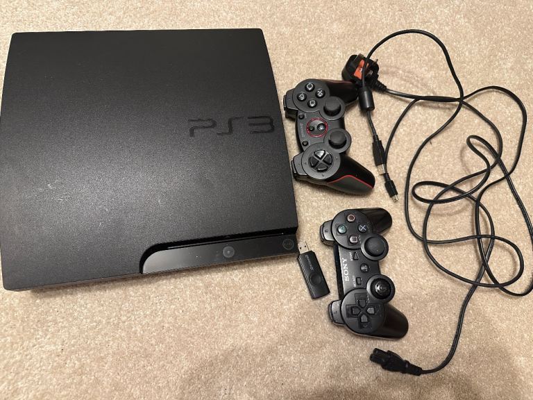 PS3 160 gb with two controllers and 51 games