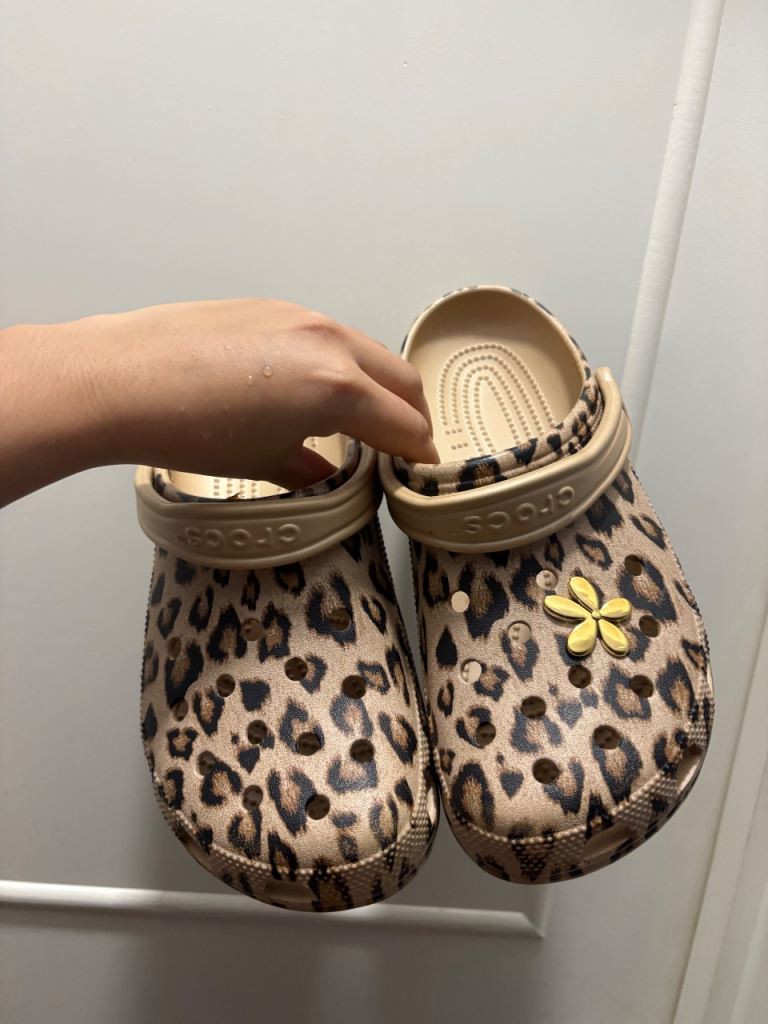 Crocs Leopard Print Clogs with Flower Charm – Good Condition