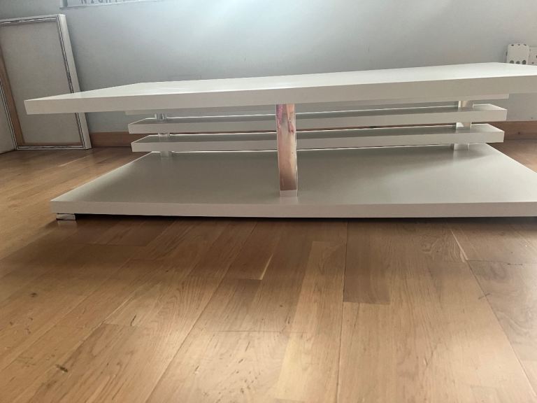 Modern White Coffee Table with Rotating Shelves
