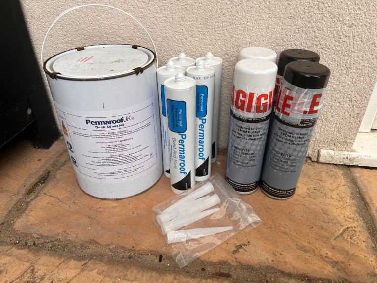 Roofing adhesive and sealers