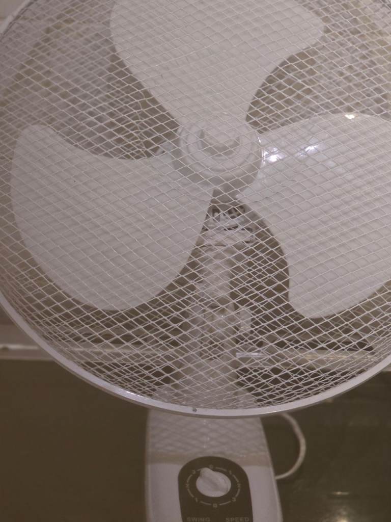 Wall mounted  fan as new