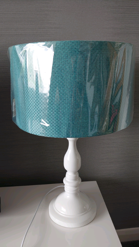 Brand New Sterling furniture table lamp with teal shade