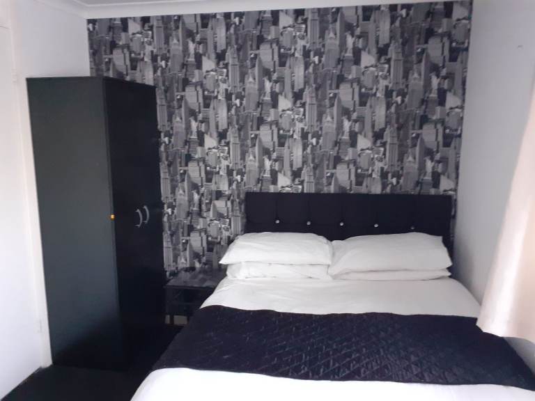 Double Bed with 2 storage draws and Diamonte wall mounted headboard