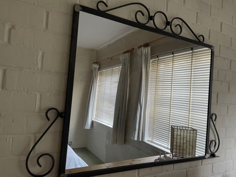 Vintage large wrought ornamental iron mirror