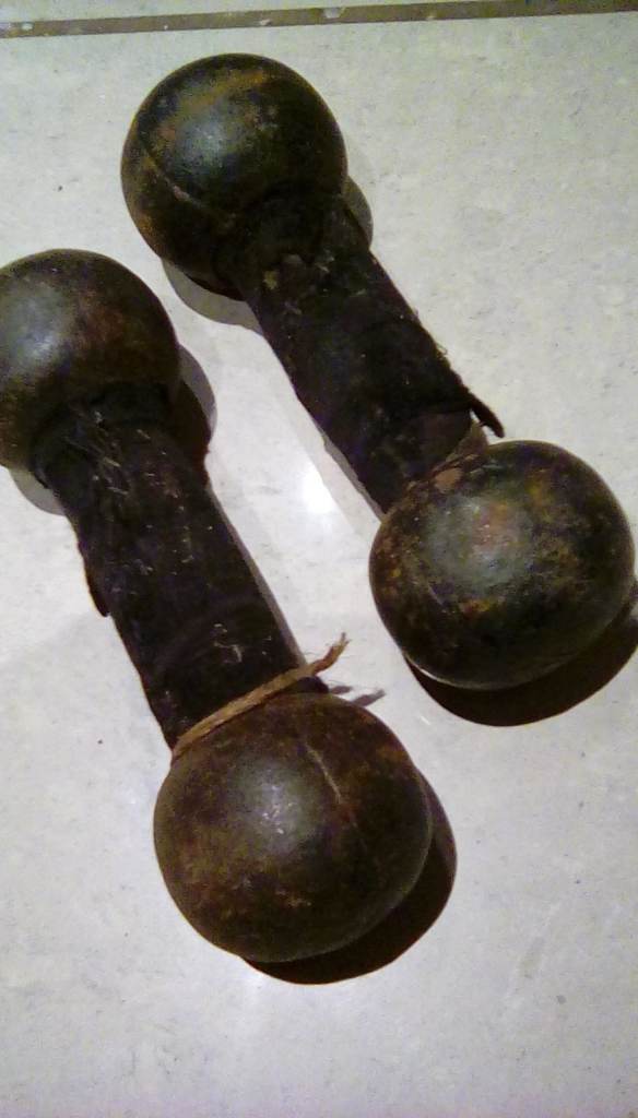 Antique dumbells