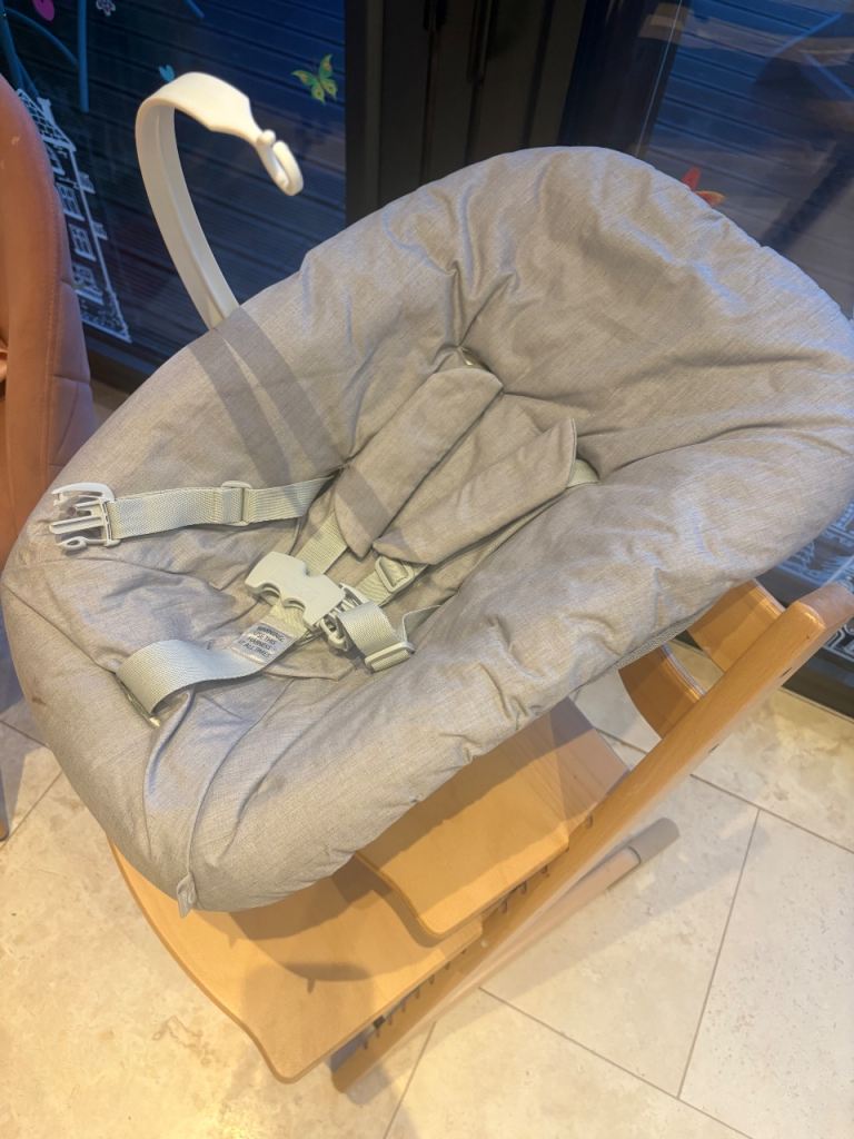 Stoke trip trapp newborn attachment with toy hook