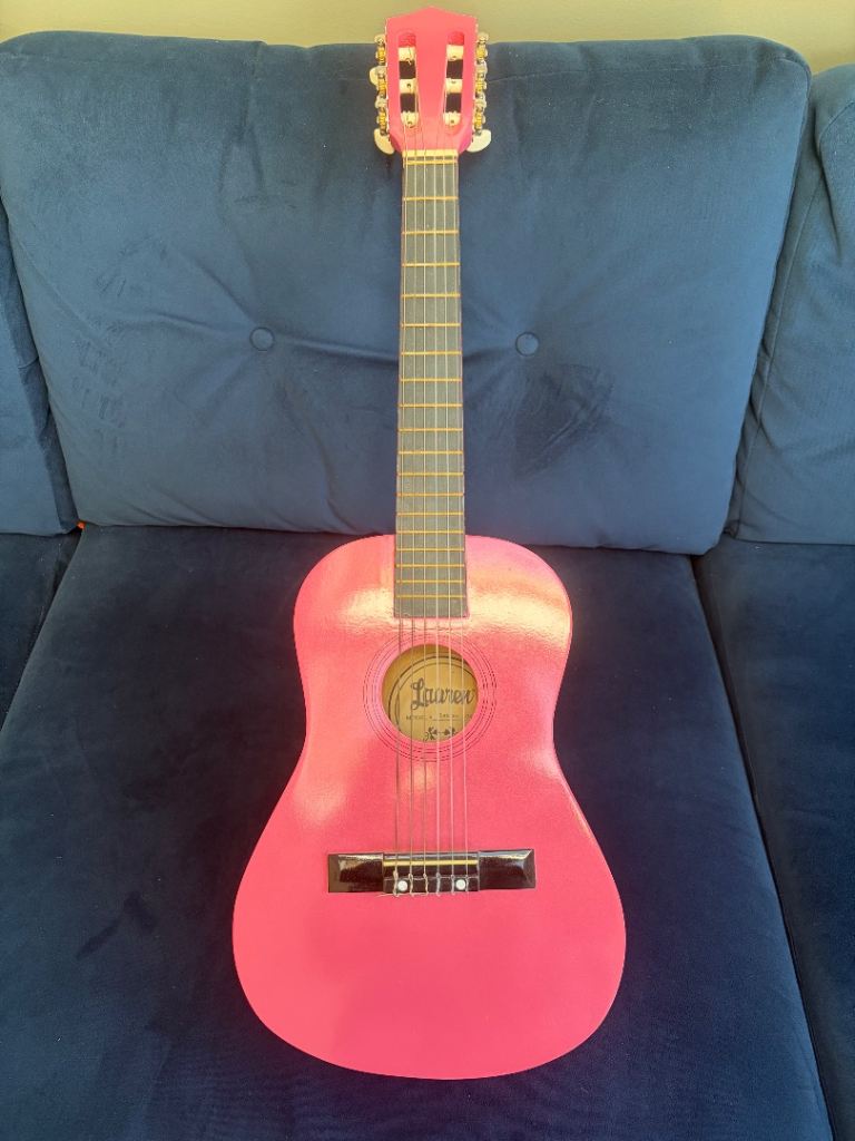 Lauren Pink guitar with case and strap