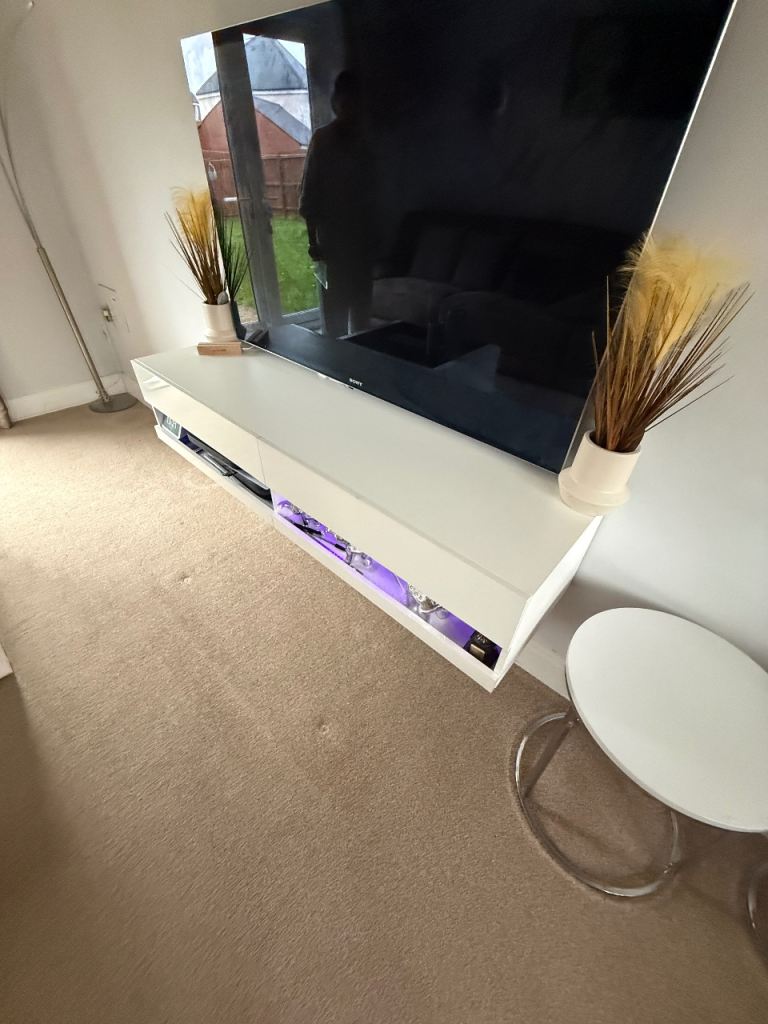 White Wall-Mounted TV Unit with Storage – Good Condition