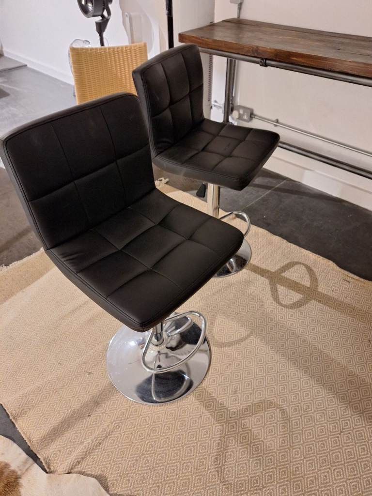 2 faux black leather & chrome adjustable height bar stools