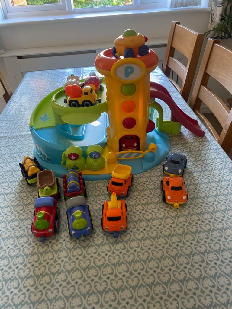 Toy garage and vehicles