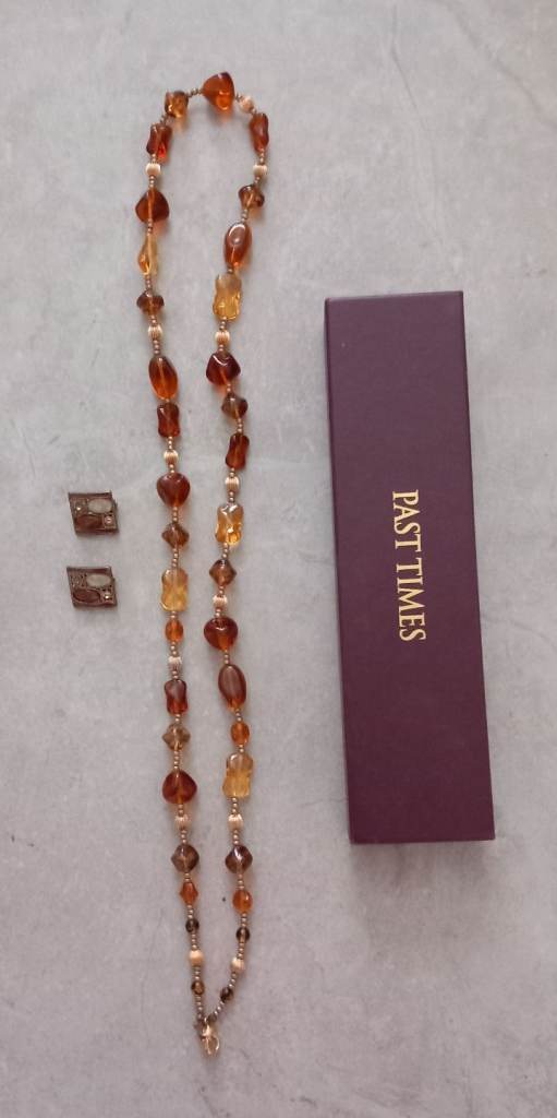 Matching Necklace and Clip-on Earrings. 