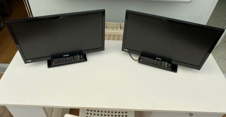 19” television with remote control x 2