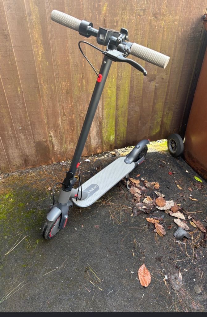 Grey Electric Scooter – Good Condition, Ready to Ride
